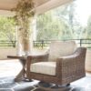 Beachcroft - Beige - Swivel Lounge Chair