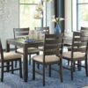 Rokane - Brown - Dining Room Table Set (Set of 7)